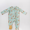 Baby onesie with ice cream cone pattern on a light blue background